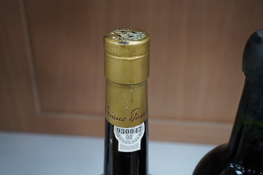 A bottle of Fonseca's vintage port 1963 and a bottle of Porto Ramos Pinto (10 years). Condition - storage unknown, appears good other than some wear